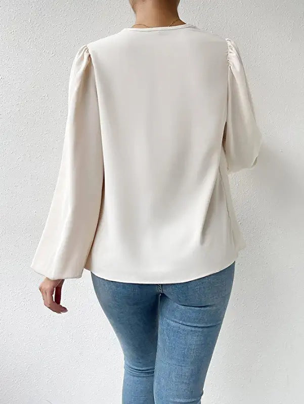 Élégante blouse plissée à manches longues
