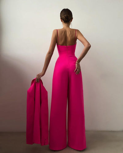 Look vibrant en combinaison rose fuchsia pour une fête glamour