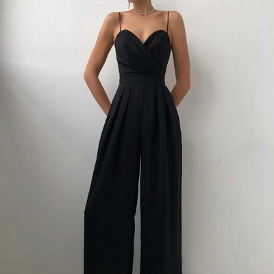 combinaison_noire_soirée.webp	Combinaison noire élégante à fines bretelles pour soirée chic